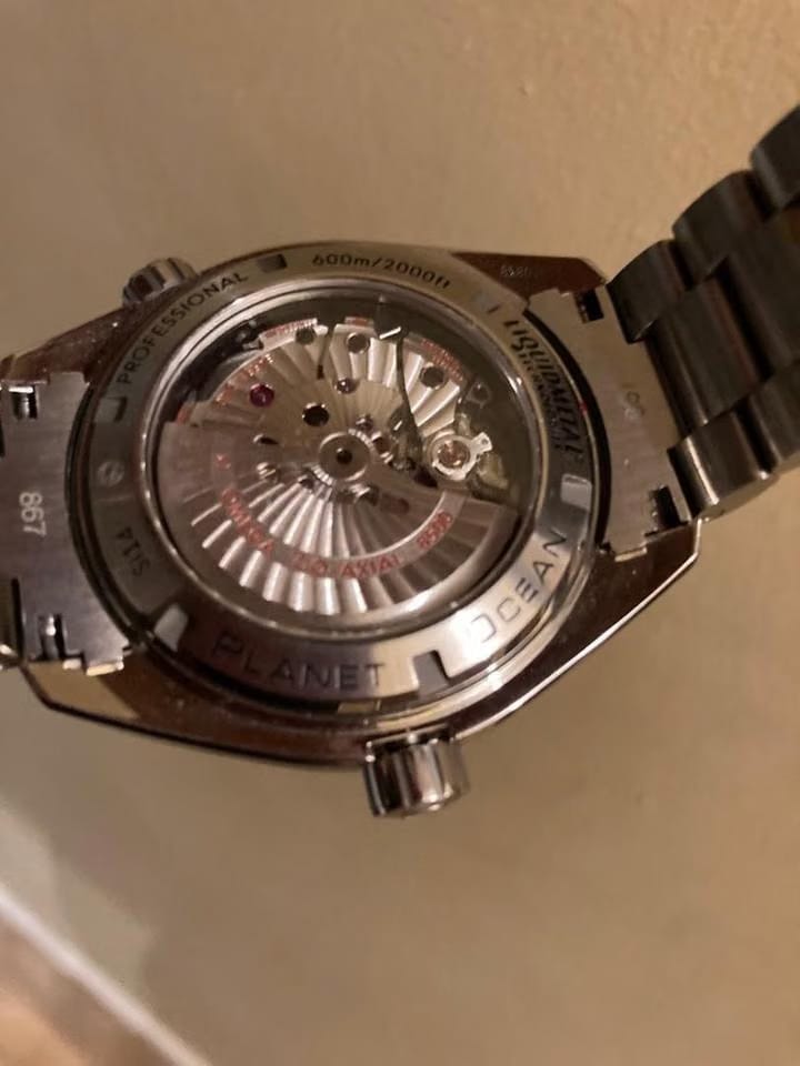 Omega Seamaster Planet Ocean Like NEW , wore twice Limited edition Mohagany display box.