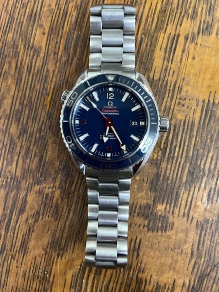 Omega Seamaster Planet Ocean Like NEW , wore twice Limited edition Mohagany display box.