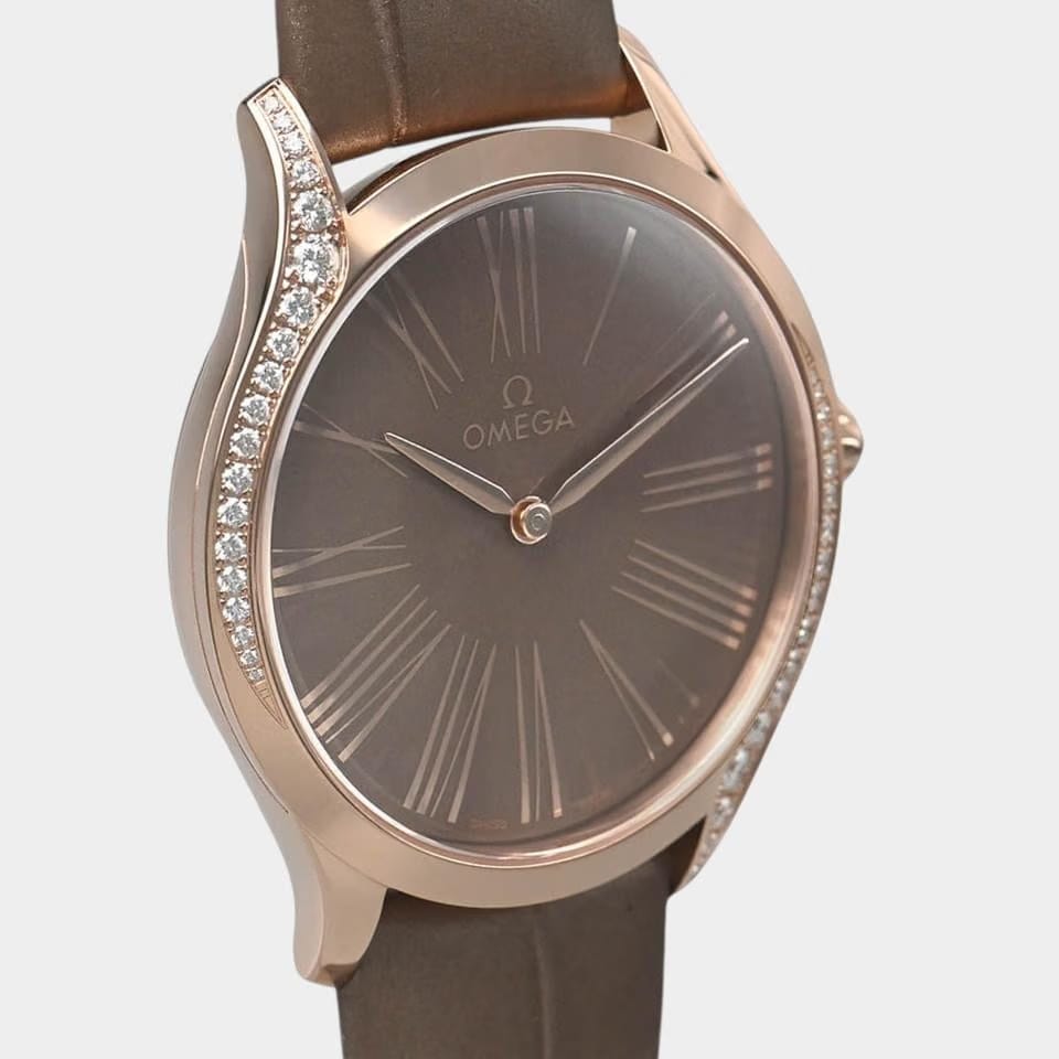Omega De Ville Trésor Sedna gold / 36 mm / Box&Papers / 428.58.36.60.03.001