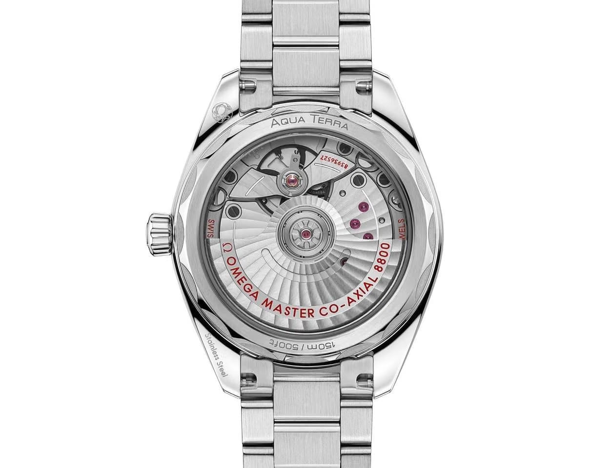 Omega Seamaster Aqua Terra Shades Lav dial 34mm 220.10.34.20.10.002 Bracelet. OMEGA logo are in diamond-polished 18 K white gold.