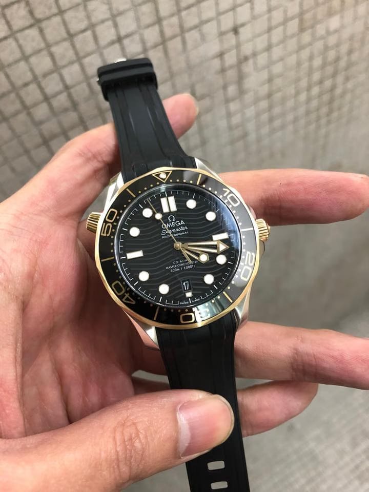 Omega Seamaster Diver 300 Mbasel one Seamaster Diver 300 M yellow gold steel black dial 42mm 5 years international warranty