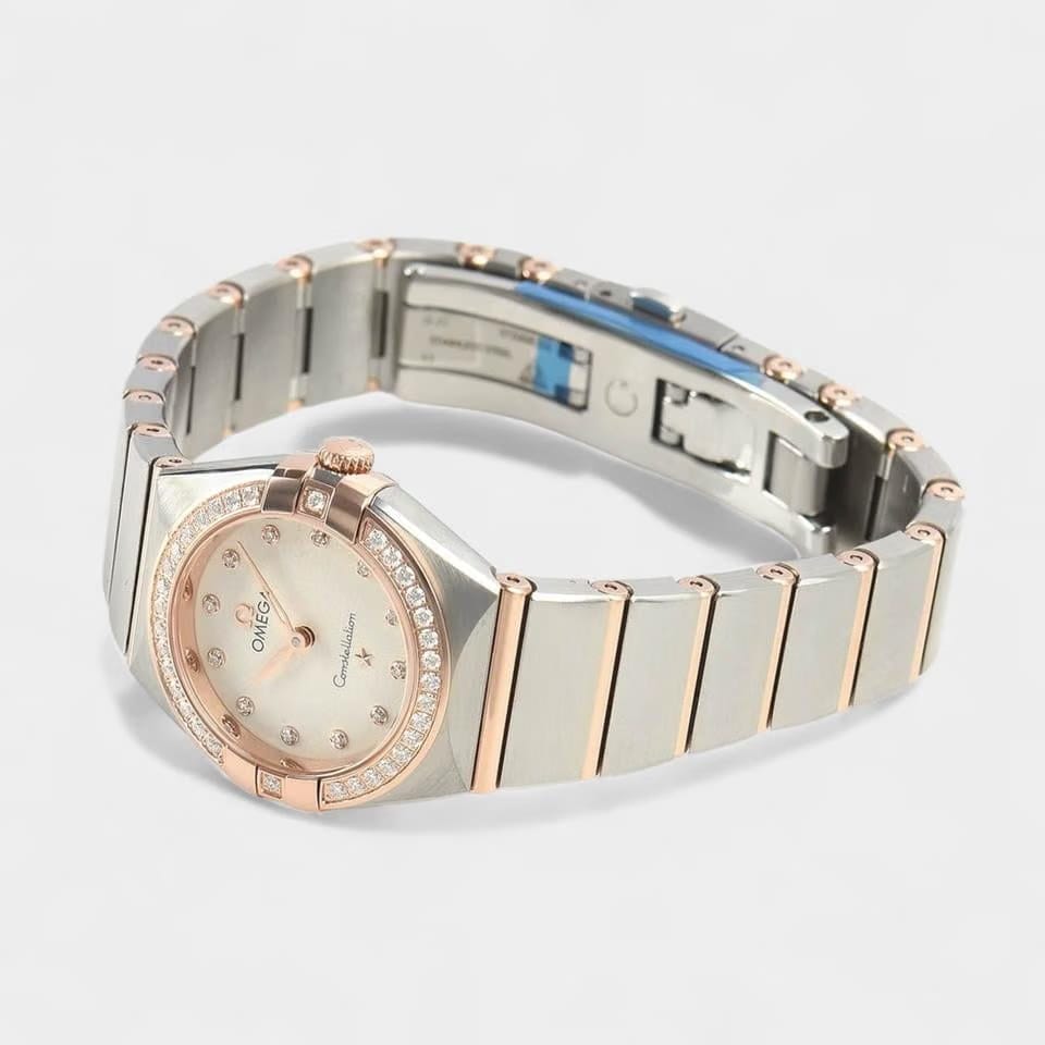 Omega Constellation Quartz Manhattan / Steel&Rose gold / 25 mm / Papers / 131.25.25.60.52.001