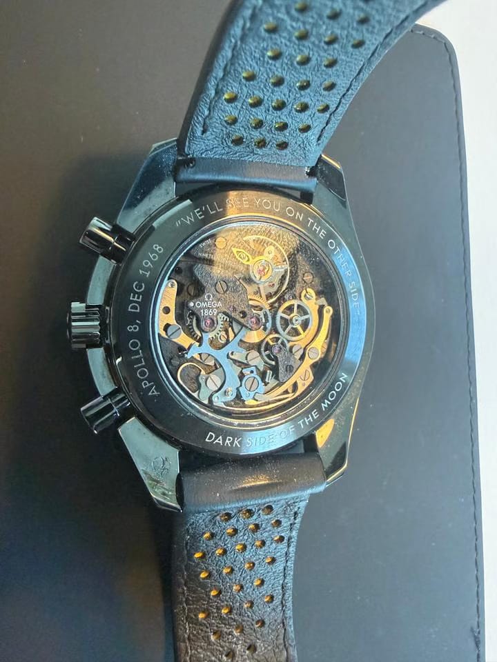 Omega Speedmaster Dark Side Of The Moon Apollo 8 Special Edition with both pin buckle & fold clasp.