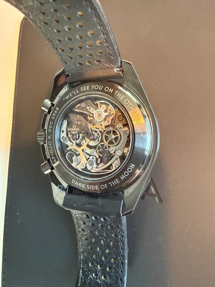 Omega Speedmaster Dark Side Of The Moon Apollo 8 Special Edition with both pin buckle & fold clasp.