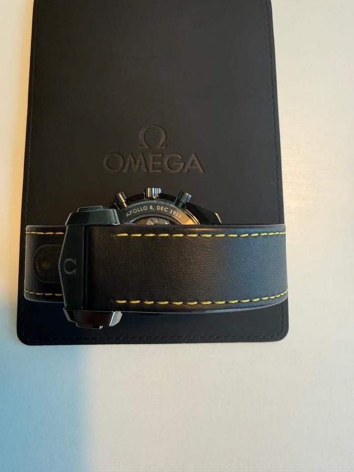 Omega Speedmaster Dark Side Of The Moon Apollo 8 Special Edition with both pin buckle & fold clasp.