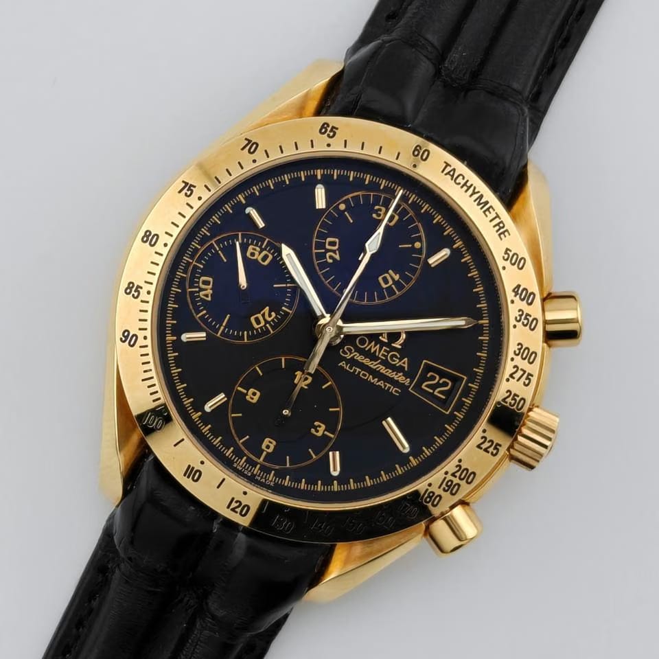 Omega Speedmaster Date3613.53.00 quadrante nero / cassa oro 18 Kt / cinturino pelle / NOS