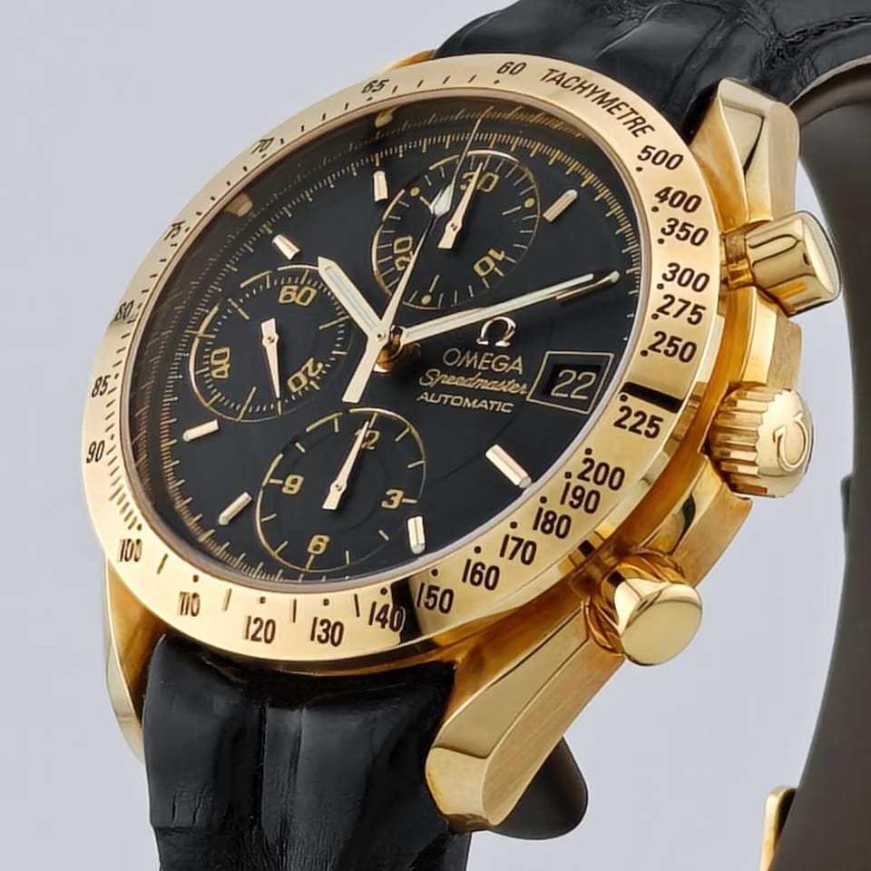 Omega Speedmaster Date3613.53.00 quadrante nero / cassa oro 18 Kt / cinturino pelle / NOS