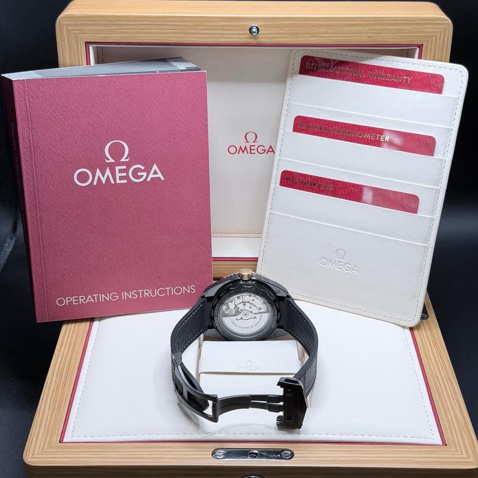 Omega Seamaster Planet Ocean2025 Unworn Full Set 18 K Gold paired w/ceramic case