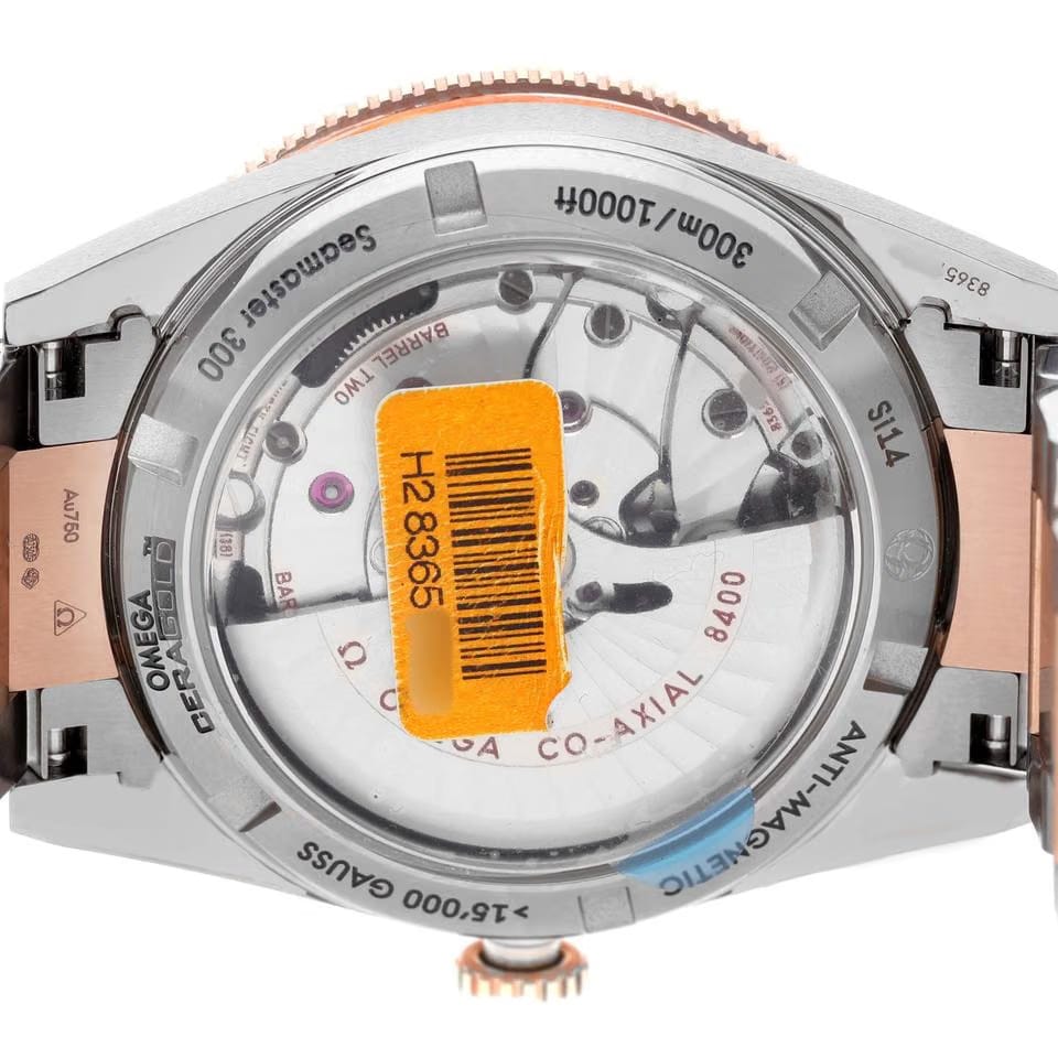 Omega Seamaster 300 Titanium Rose Gold Mens Watch 233.60.41.21.03.001 Unworn