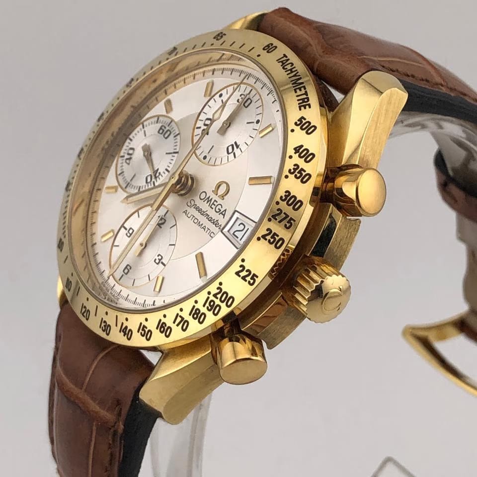 Omega Speedmaster Date Unworn authentic 18 karat solid yellow gold case