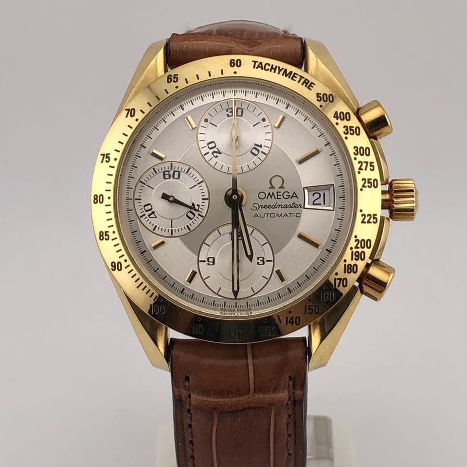 Omega Speedmaster Date Unworn authentic 18 karat solid yellow gold case