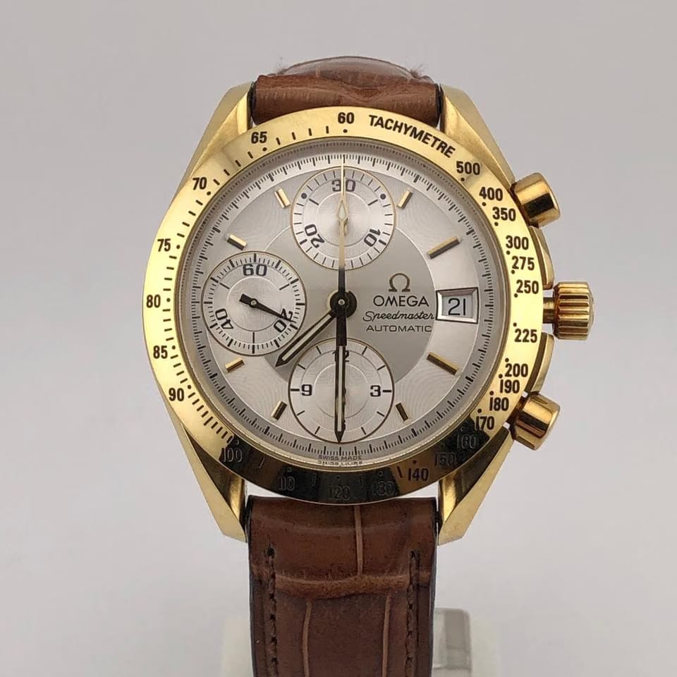 Omega Speedmaster Date Unworn authentic 18 karat solid yellow gold case