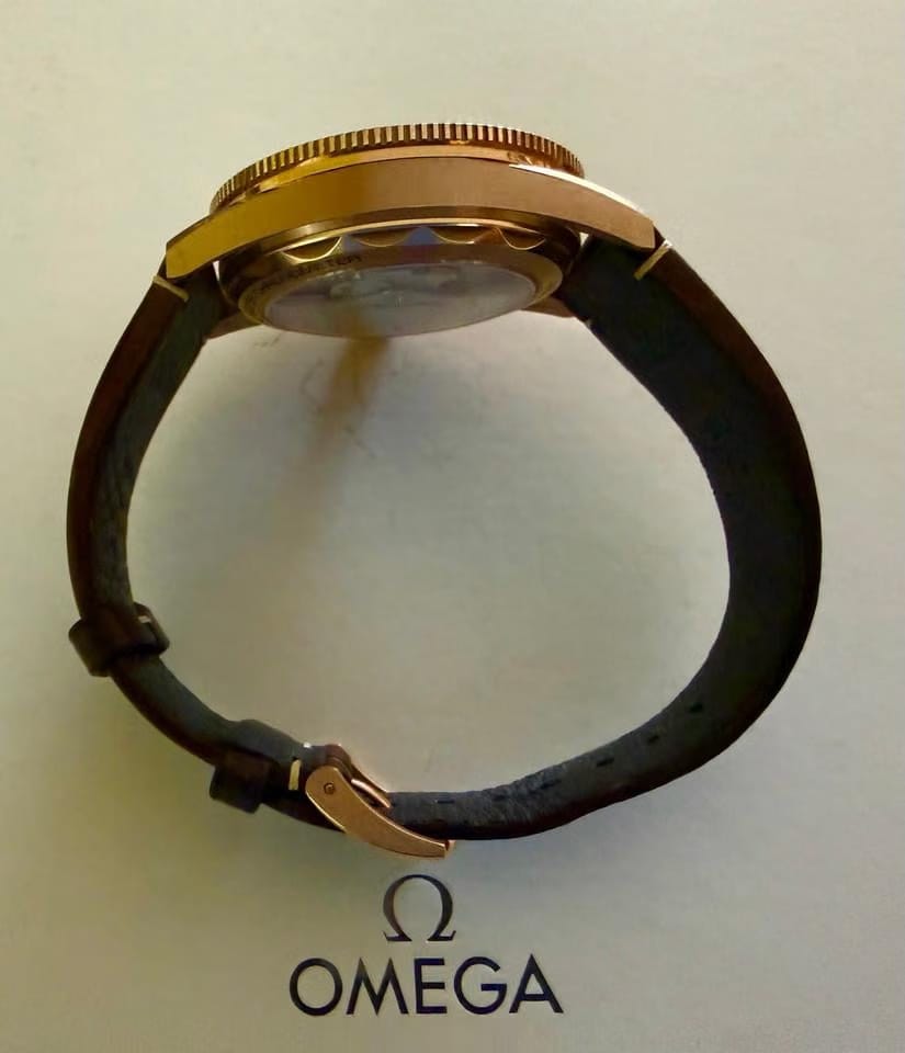 Omega Seamaster 300 Co-Axial Master Chronometer The 41 mm case and bezel are crafted from 9 K Bronze Gold wh