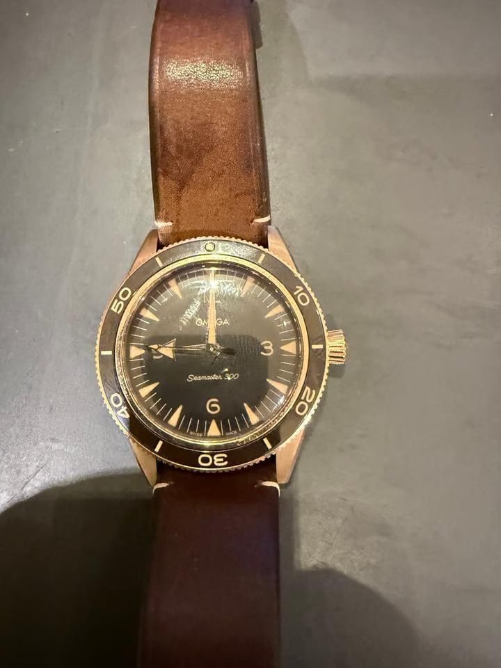 Omega Seamaster 300 Co-Axial Master Chronometer The 41 mm case and bezel are crafted from 9 K Bronze Gold wh