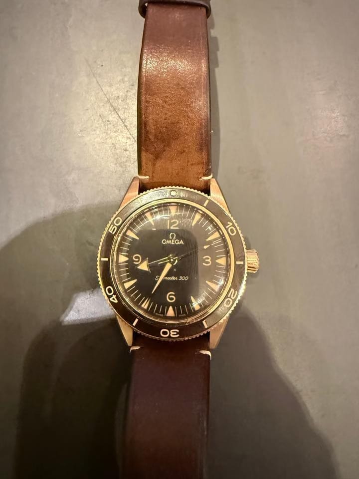 Omega Seamaster 300 Co-Axial Master Chronometer The 41 mm case and bezel are crafted from 9 K Bronze Gold wh