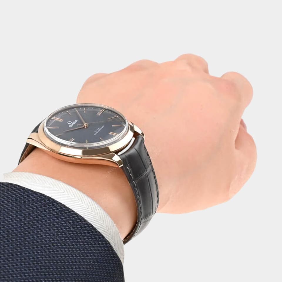 Omega De Ville Trésor Sedna gold / 40 mm / Box&Papers / 435.53.40.21.06.001