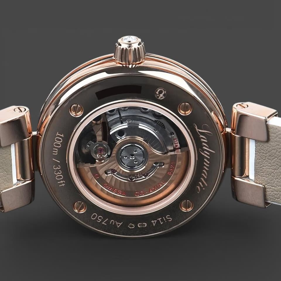 Omega De Ville Ladymatic Sedna gold / 34 mm / Box&Papers / 425.67.34.20.55.009