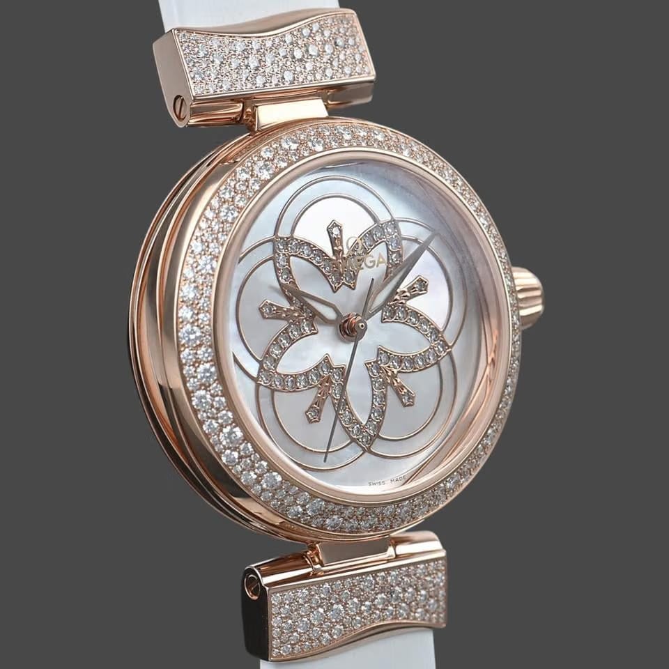 Omega De Ville Ladymatic Sedna gold / 34 mm / Box&Papers / 425.67.34.20.55.009