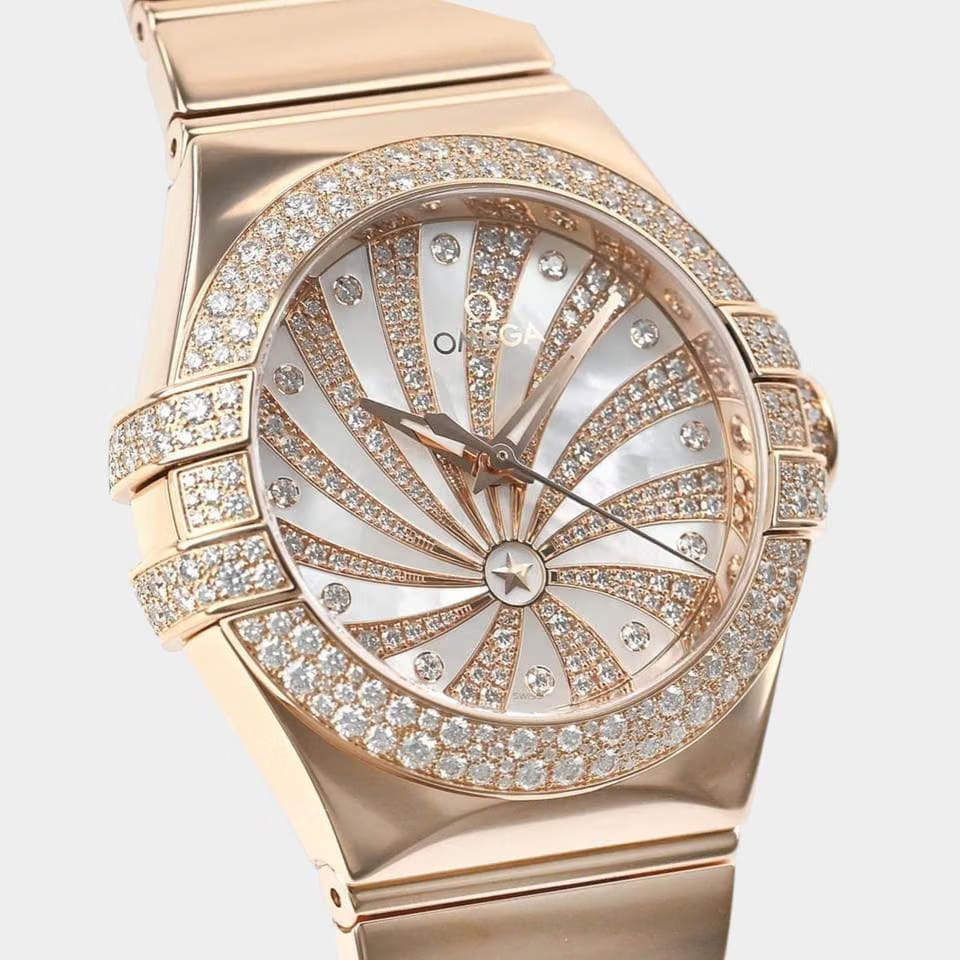 Omega Constellation Ladies Red gold / 31 mm / Box&Papers / 123.55.31.20.55.010
