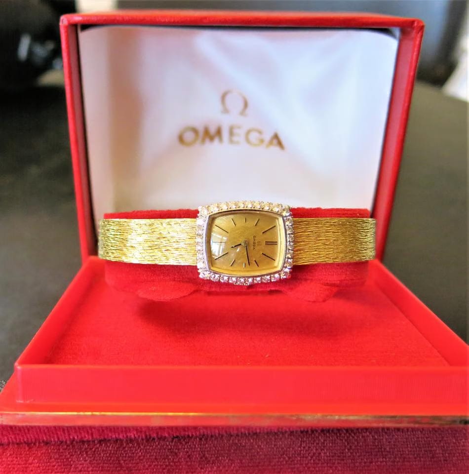 Omega Lady dresswatch gold with diamonda