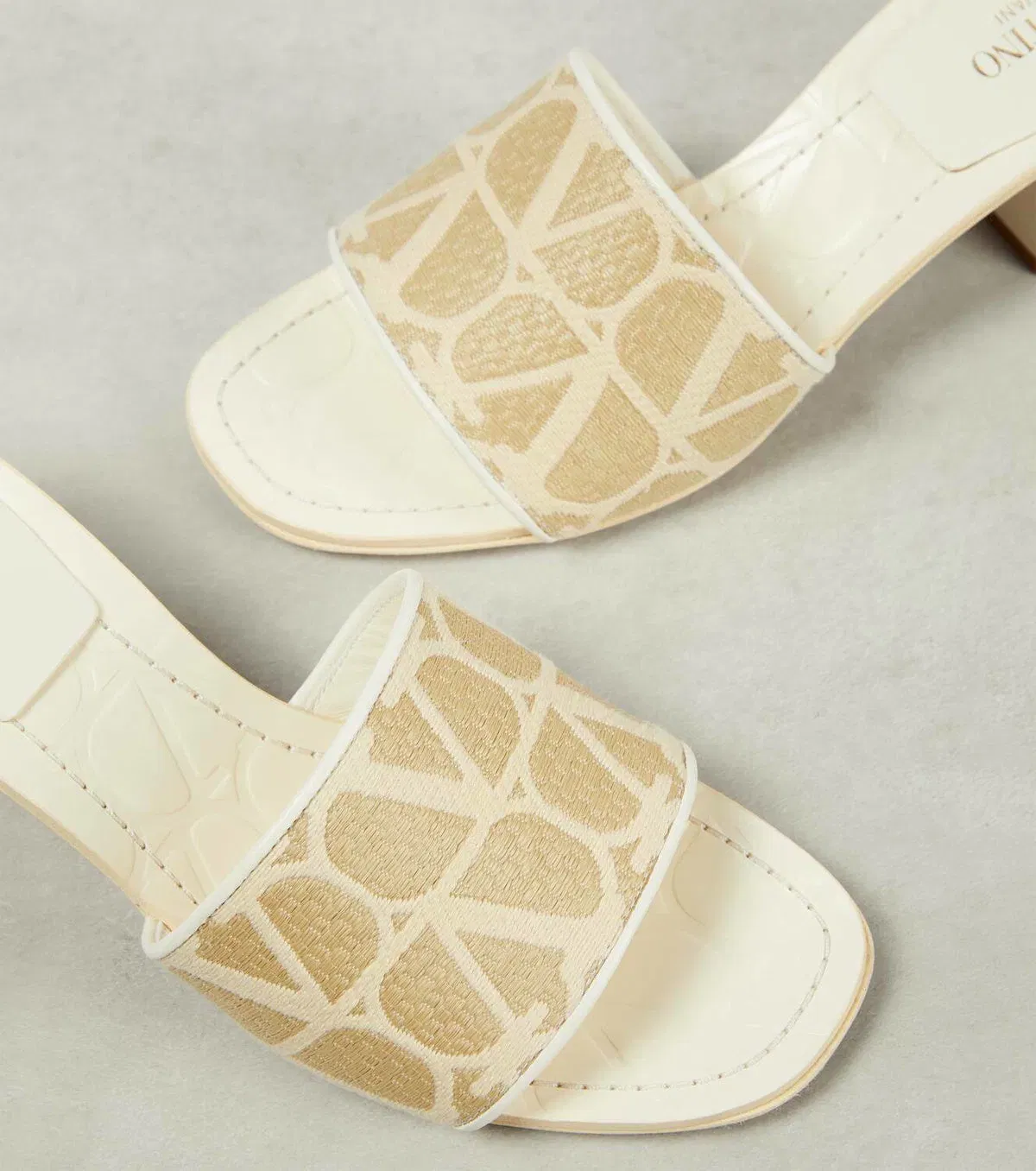 Toile Iconographe 50 raffia-trimmed mules