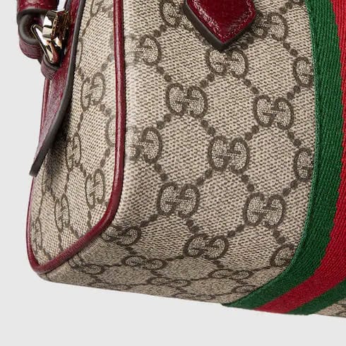 Ophidia mini boston bag