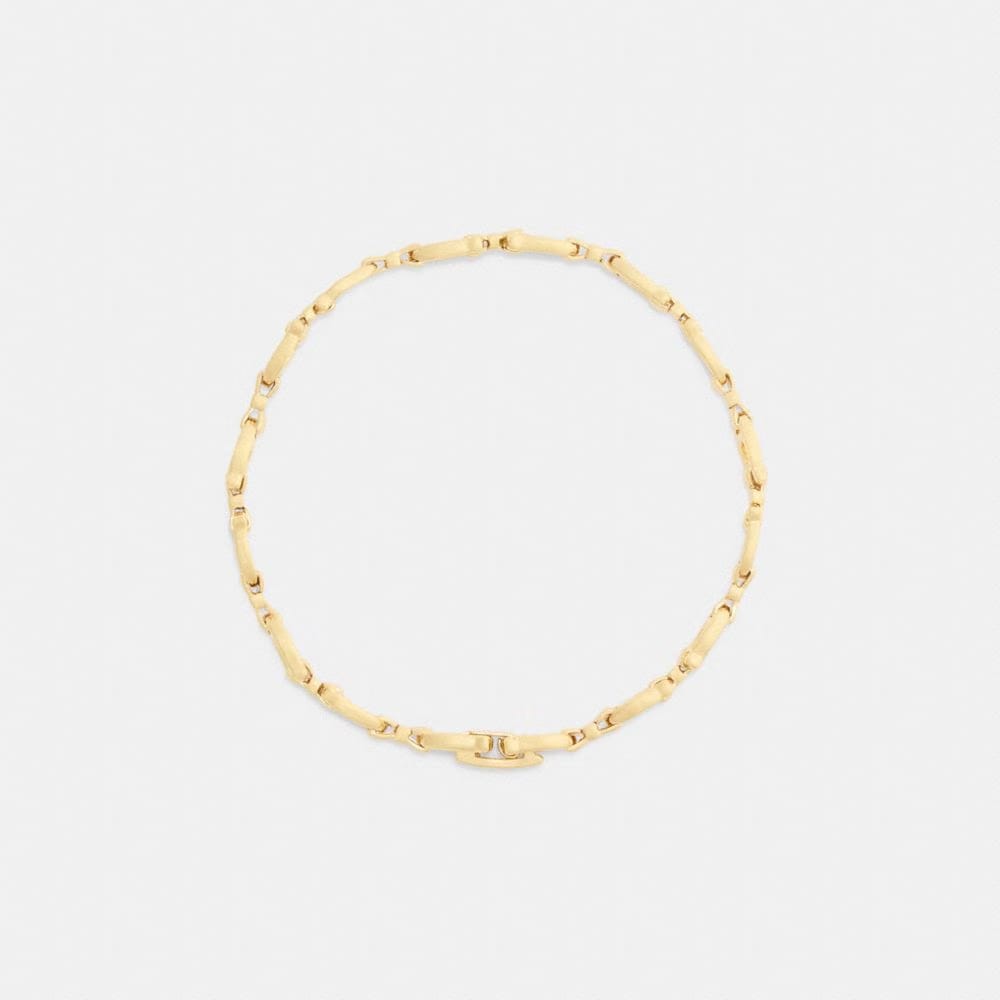Coach Bow Chain Linear Bracelet Gold