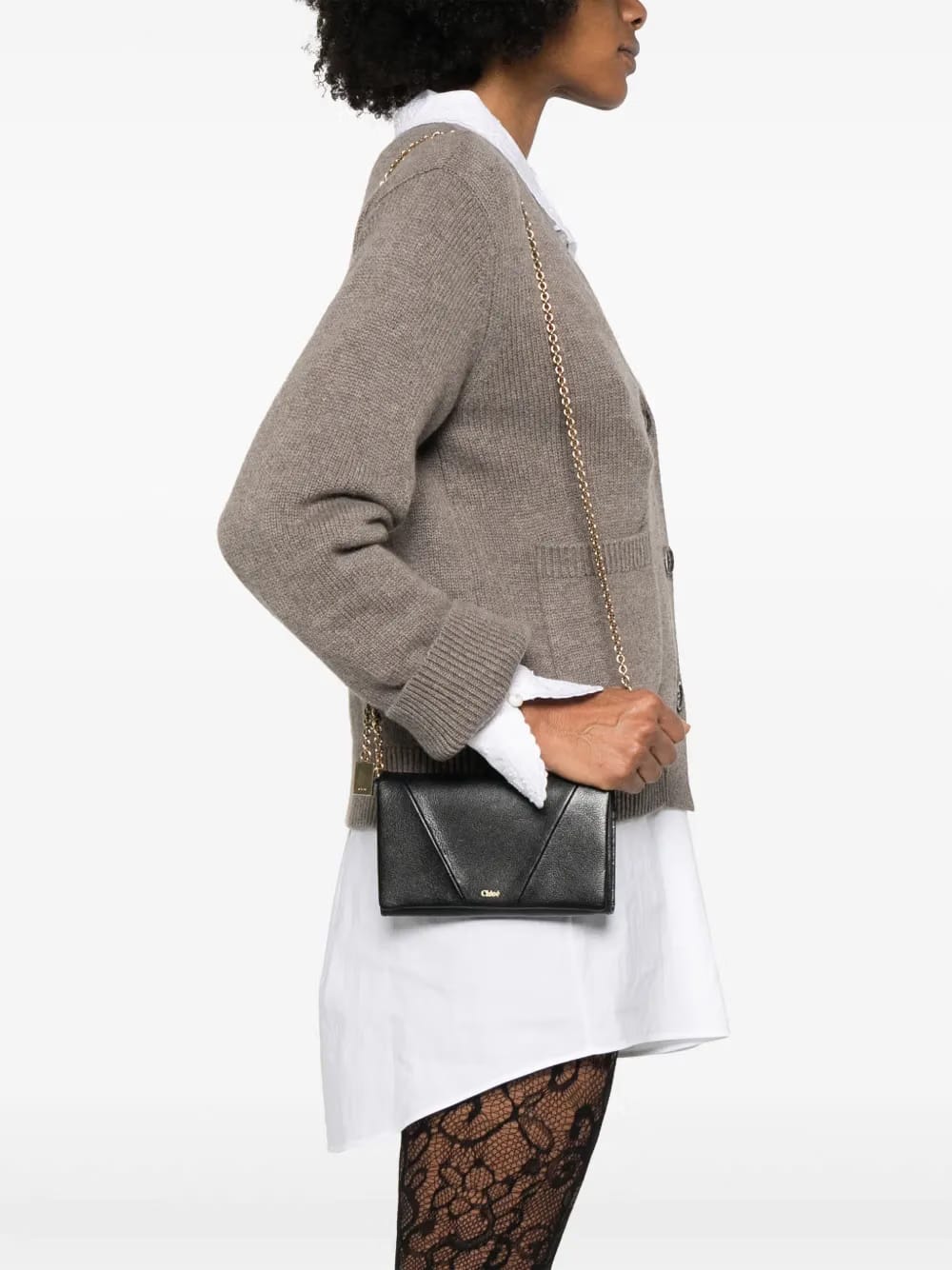 Spin flap cross body bag