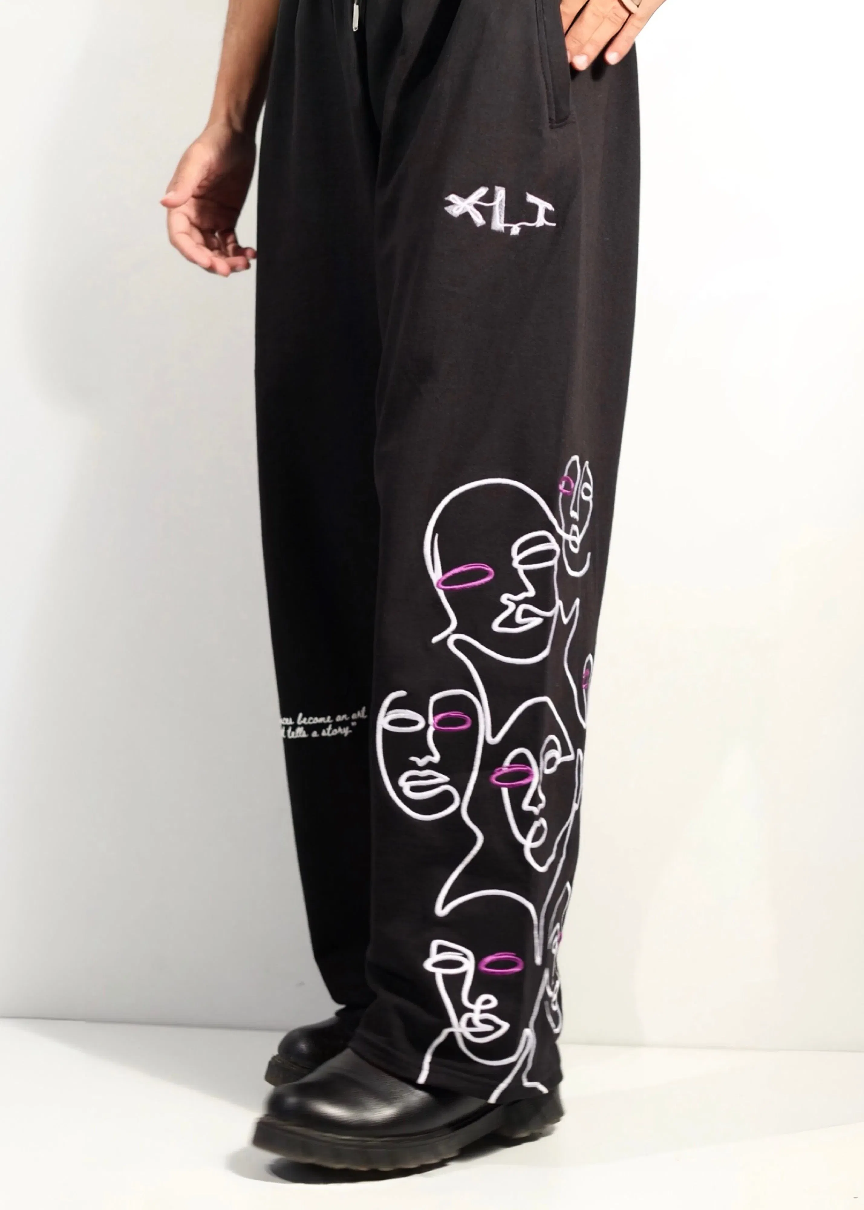 BLACK ‘VOID FACES’ PANTS