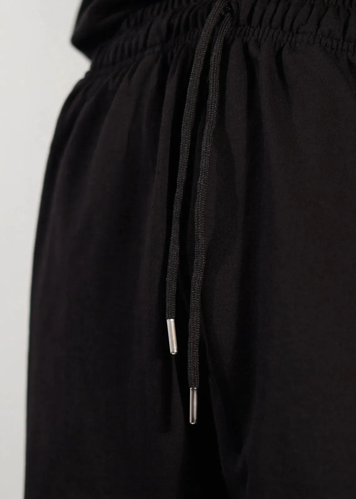BLACK ‘VOID FACES’ PANTS