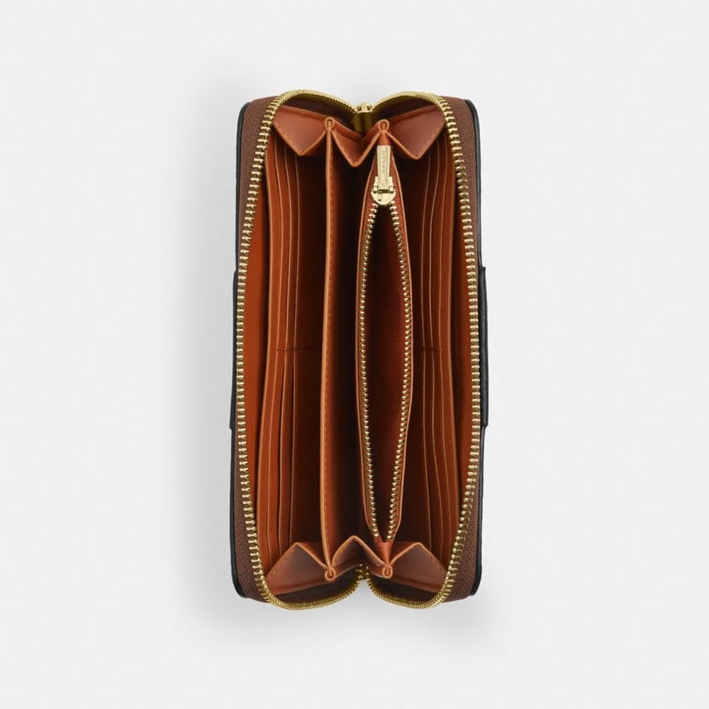 Coach Long Zip Around Wallet In Signature Canvas With Stripe Gold Tan Black