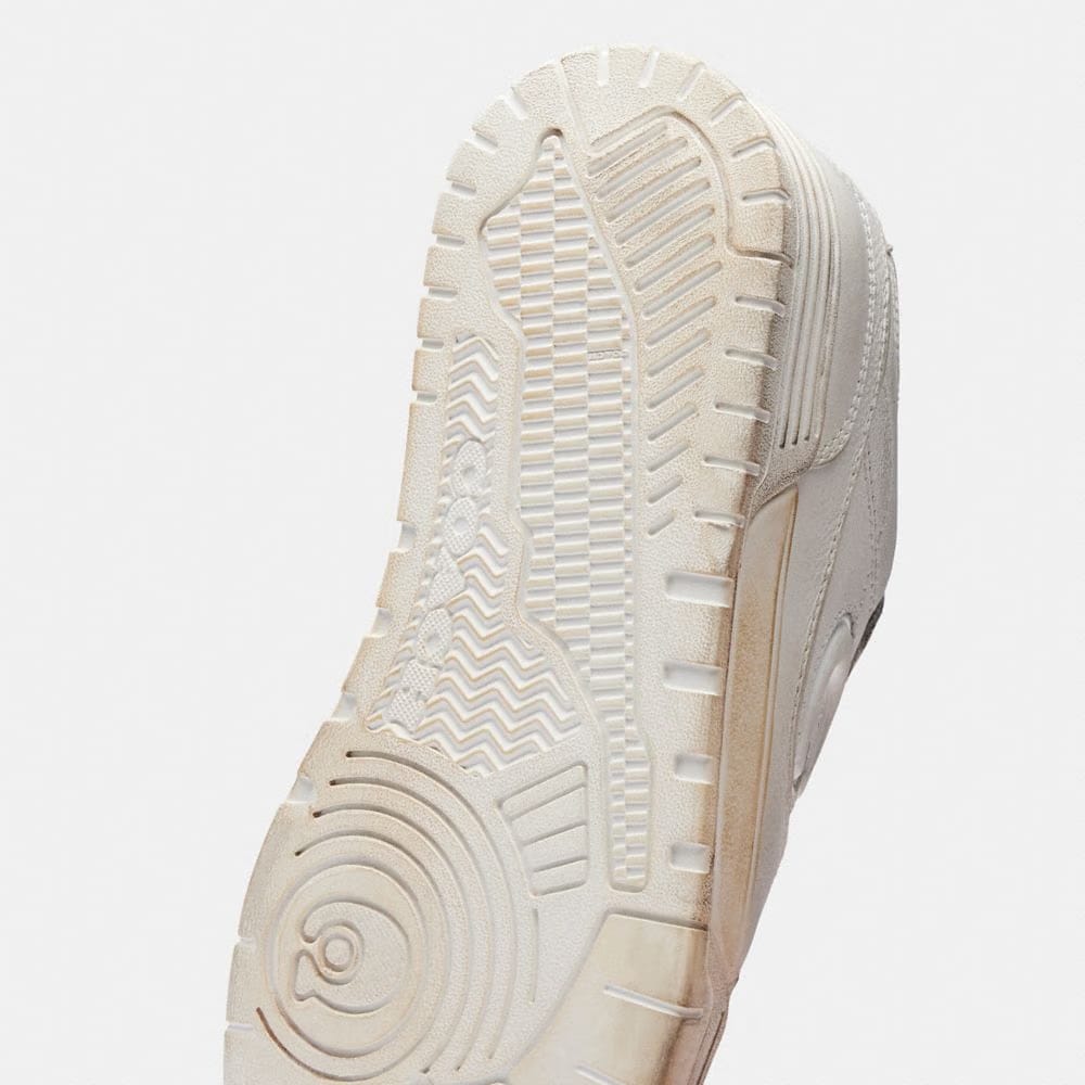 Women's Coach Soho Sneaker In Loved Leather White