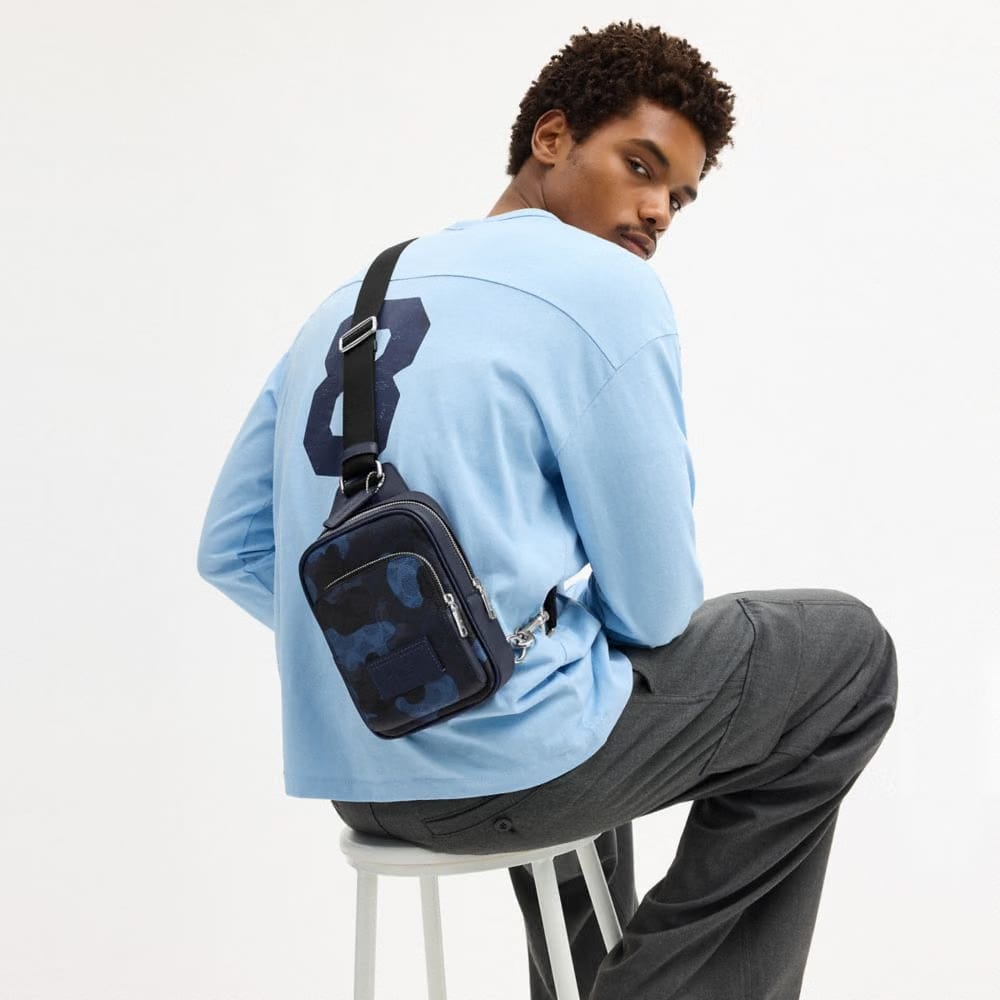 Coach Racer Sling Pack In Signature Camo Print Silver