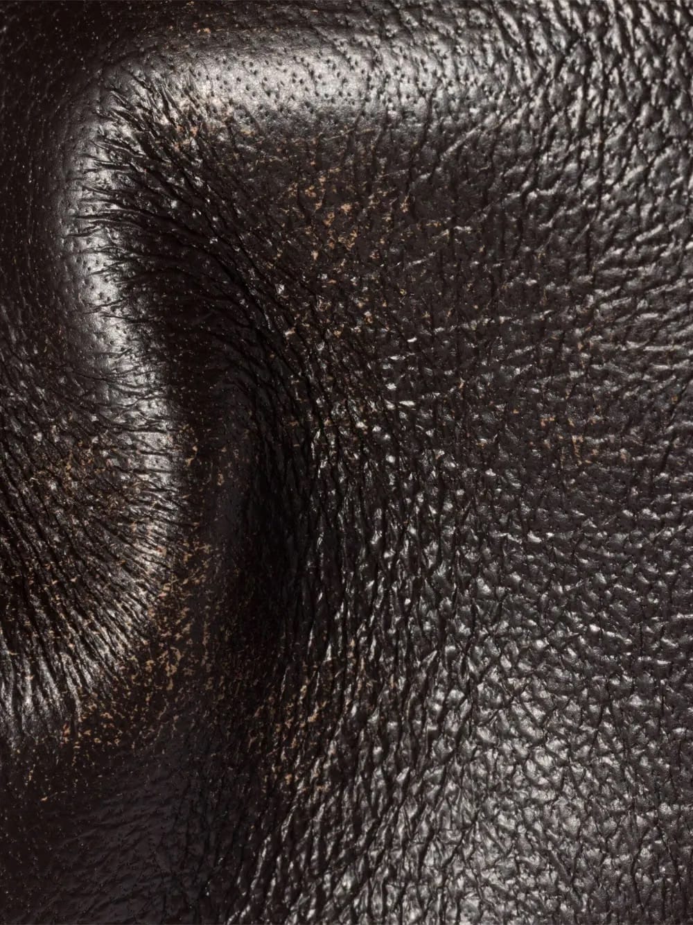 embossed-logo cylinder shoulder bag