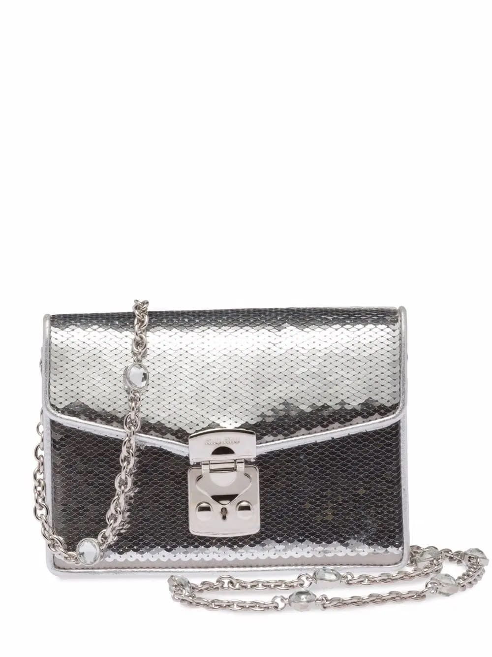 Confidential sequin-embellished leather bag