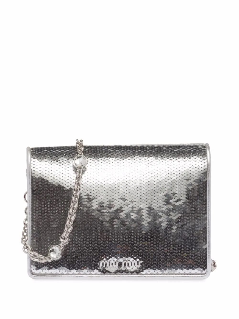 Confidential sequin-embellished leather bag