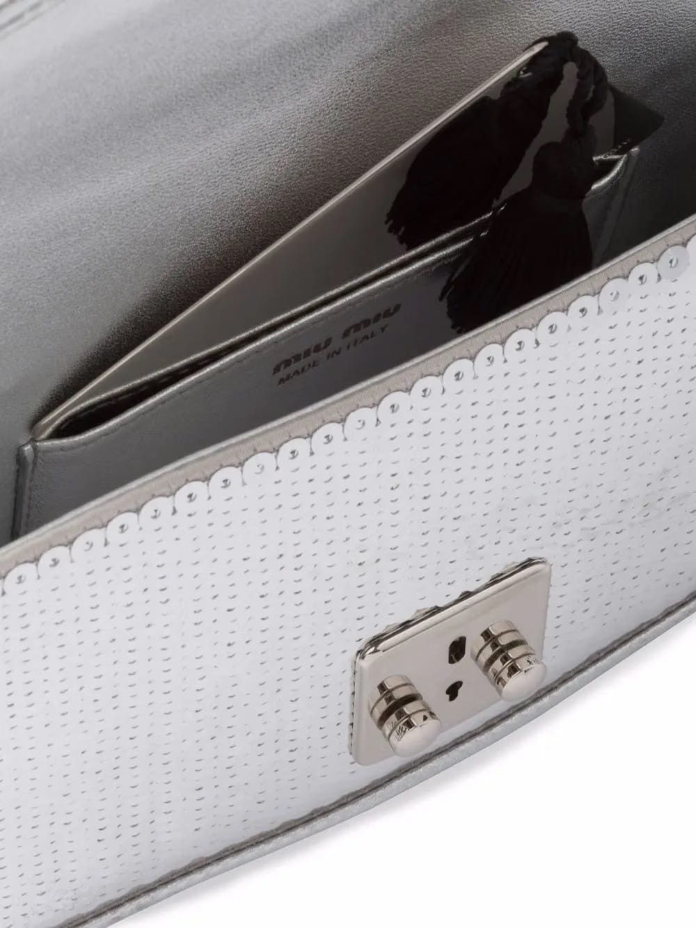 Confidential sequin-embellished leather bag