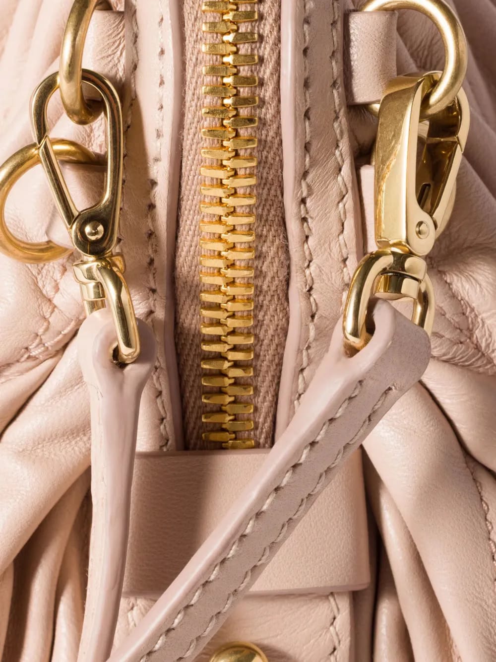 matelassé leather clutch bag