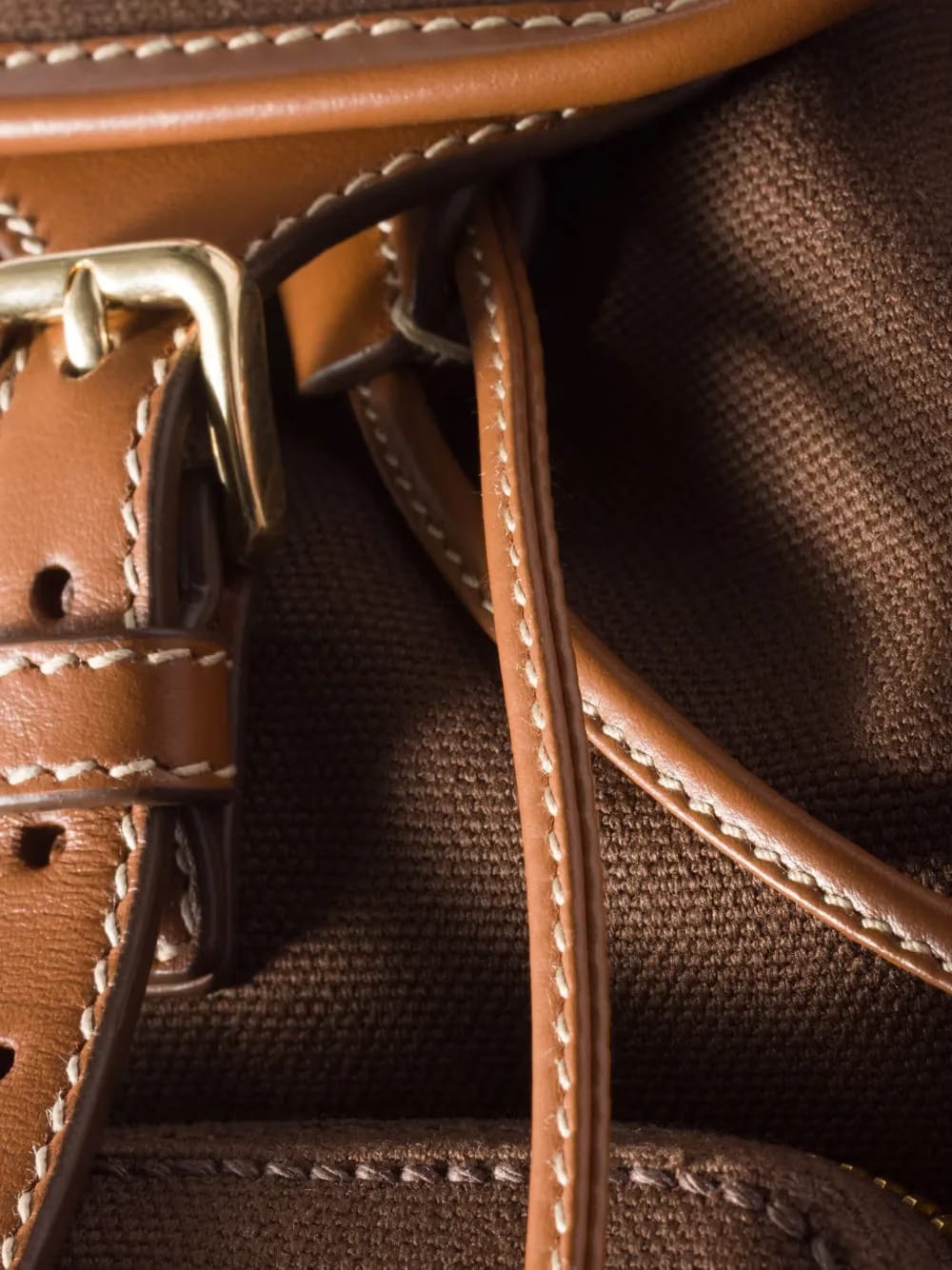 leather-trimmed canvas backpack