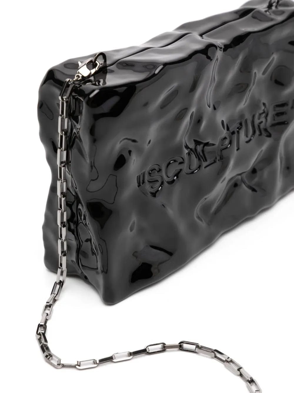 Quote textured clutch bag