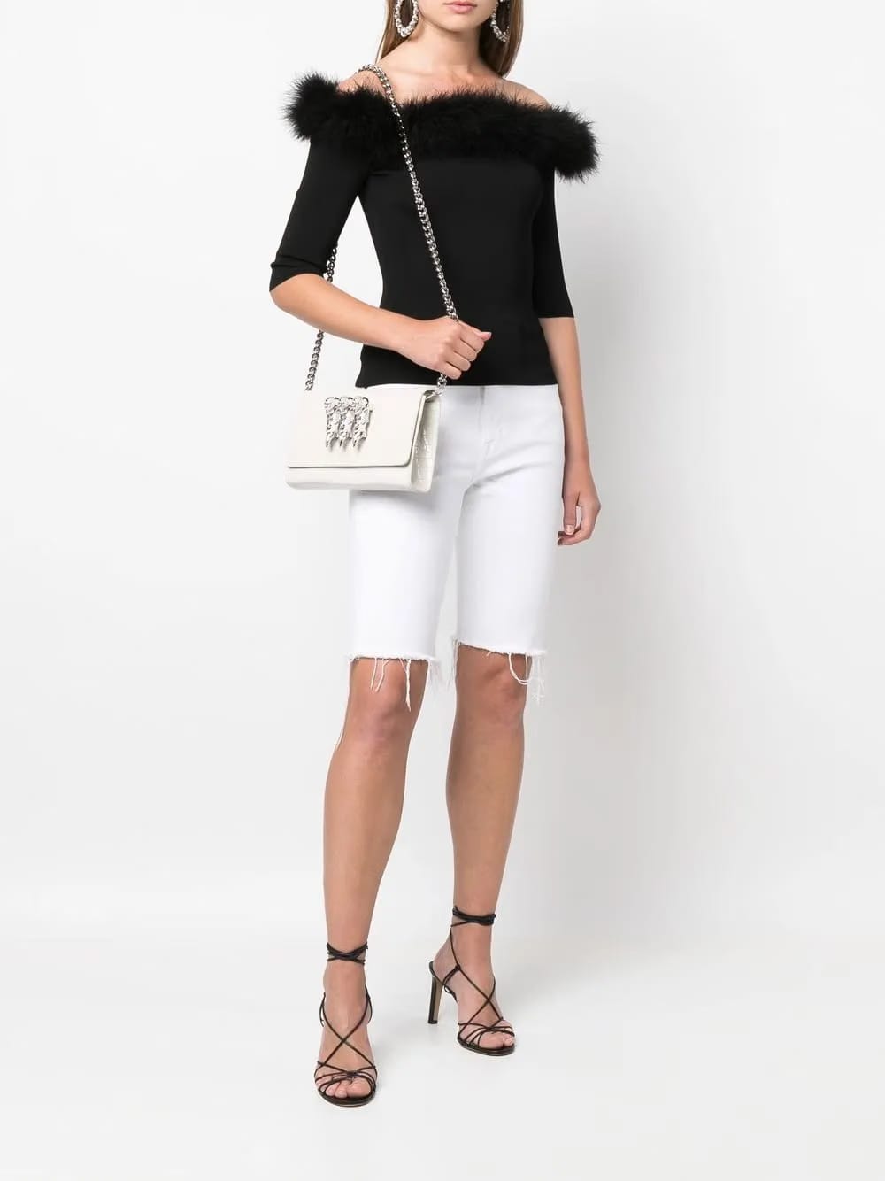 skull-charm crossbody clutch bag