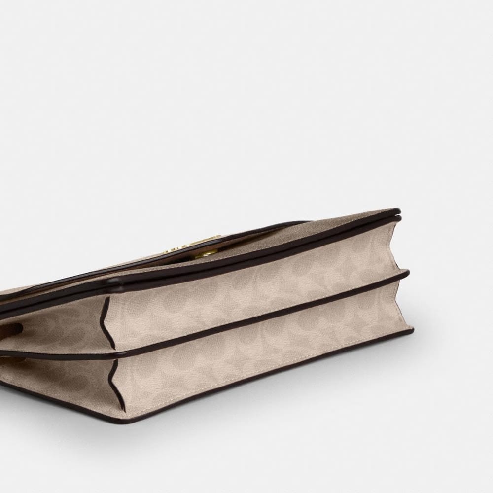 Klare Envelope Crossbody Bag In Blocked Signature Canvas