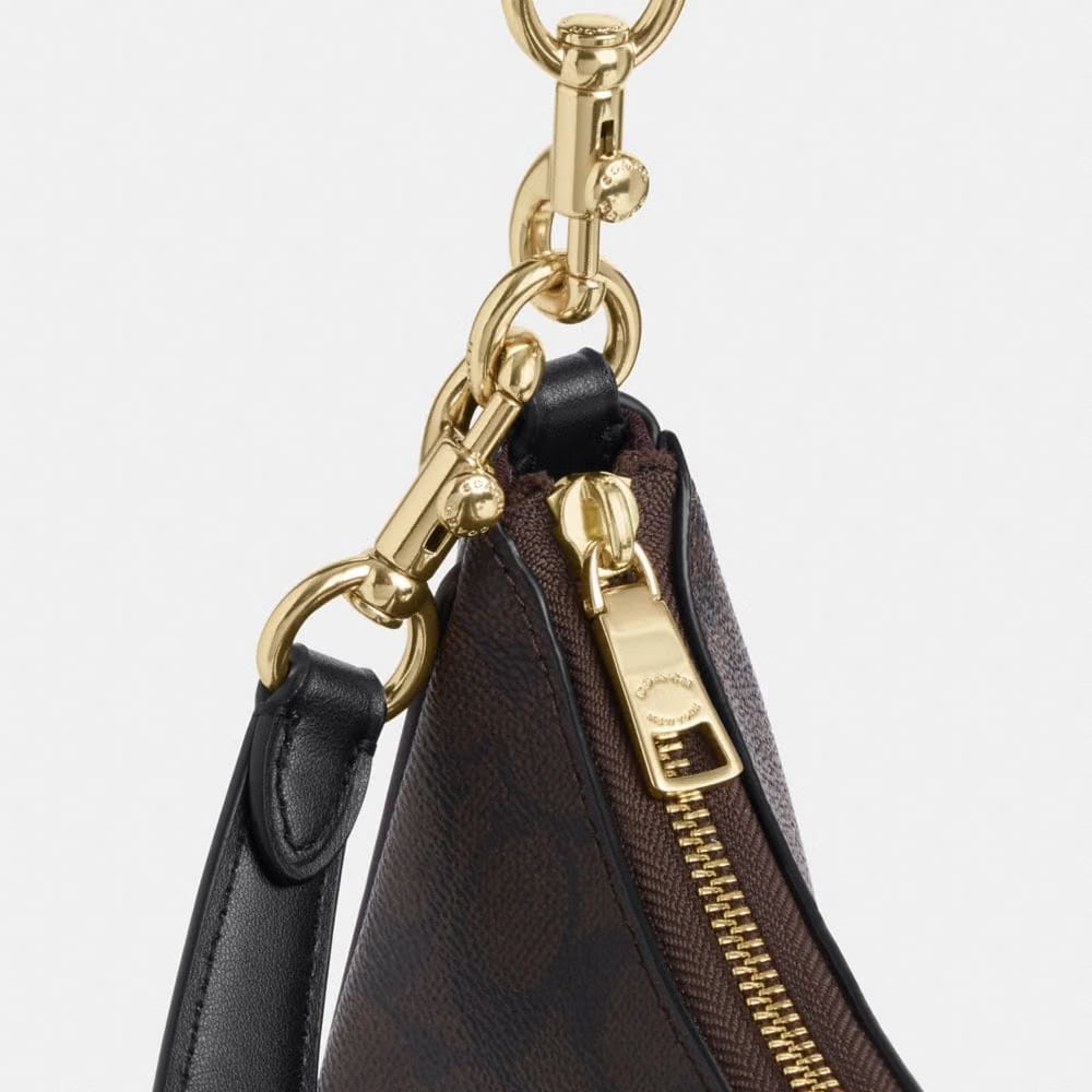 Coach Teri Hobo Bag In Signature Canvas in Gold Walnut Black