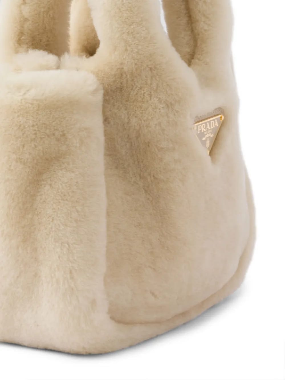 mini triangle-logo shearling tote bag