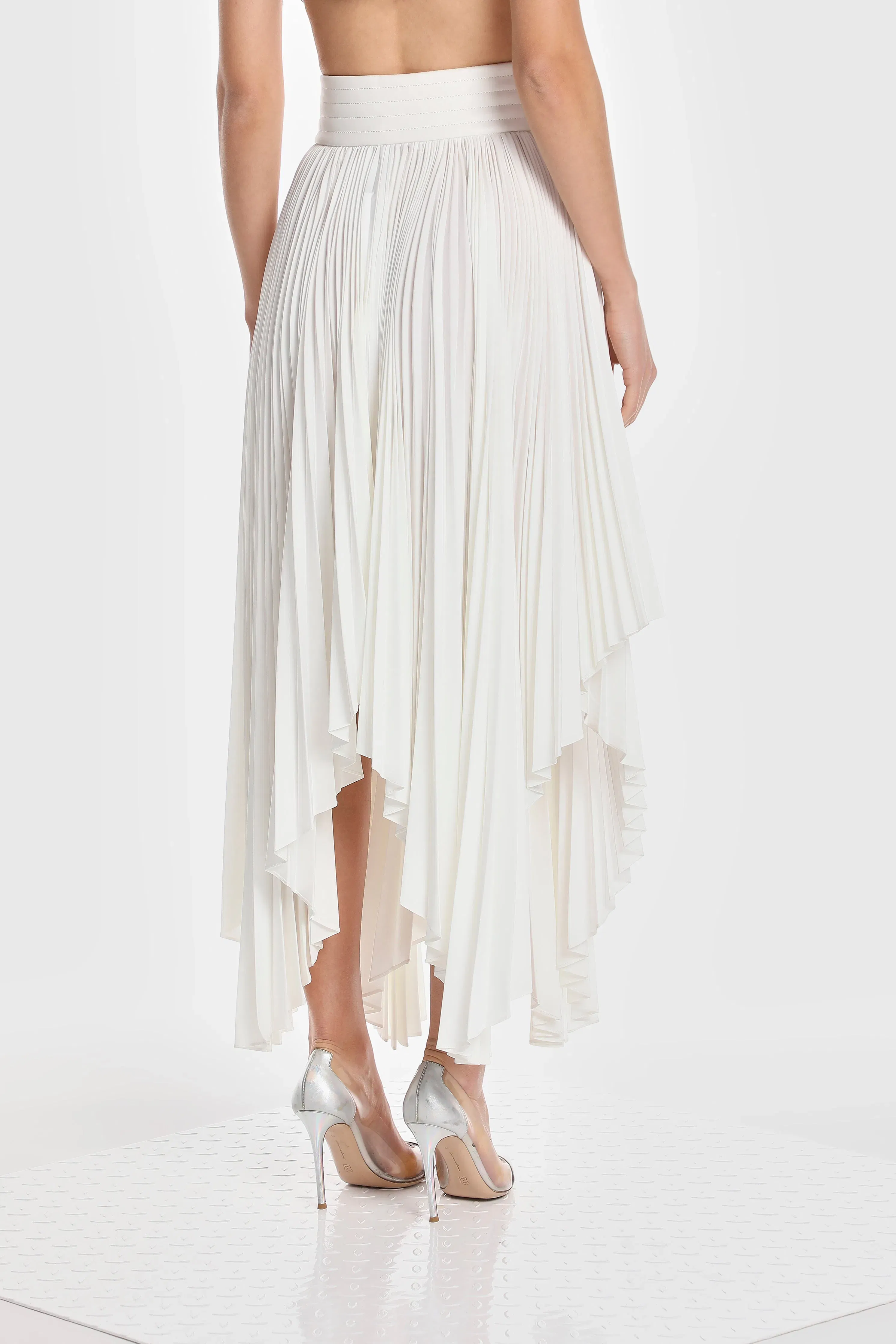 ASYMMETRIC PLEATED SKIRT W/ VEGAN LEATHER WAIST