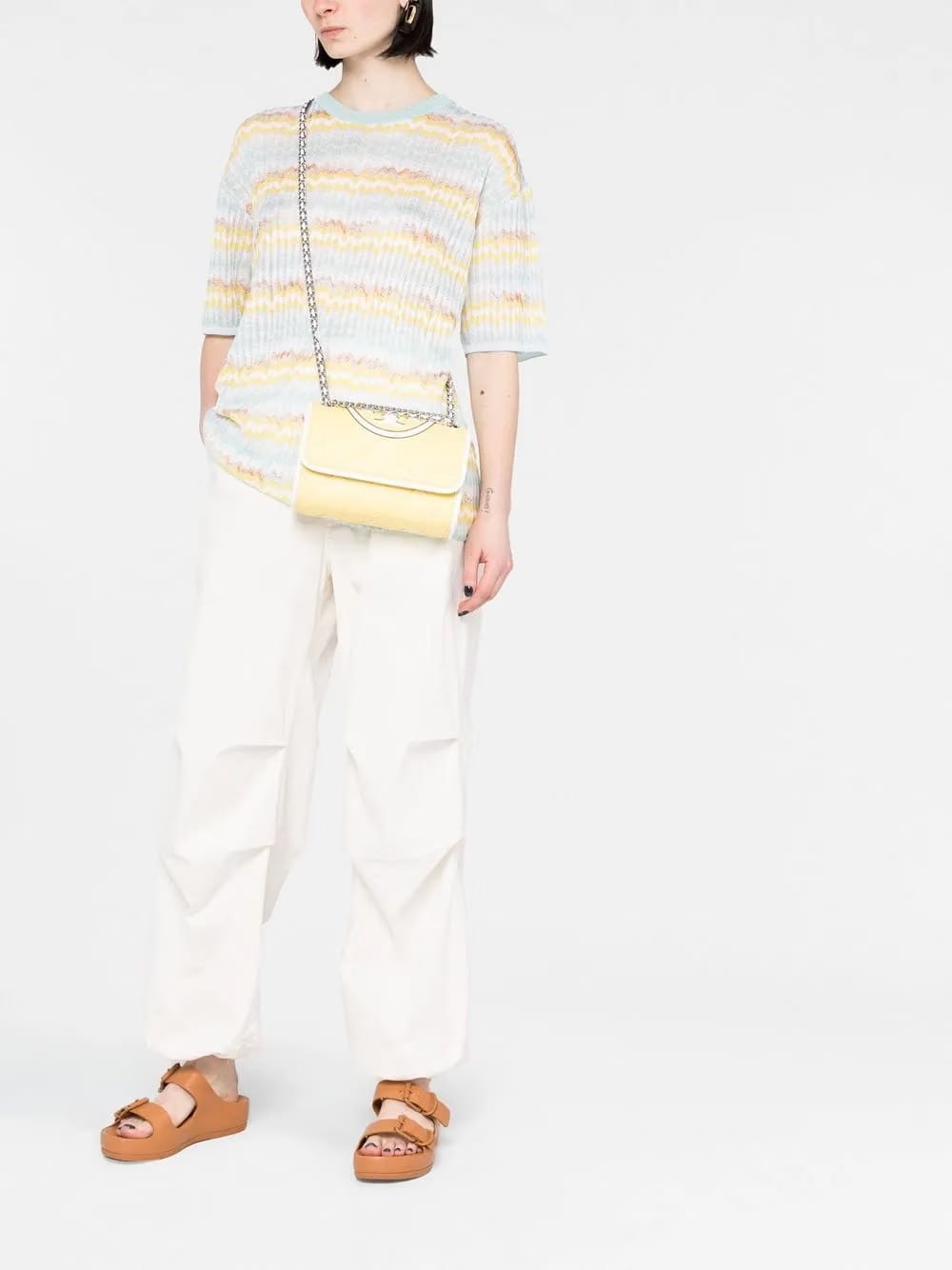 embossed and quilted cross-body bag
