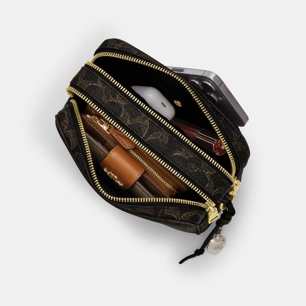 Mini Carey Crossbody Bag In Loved Signature Canvas