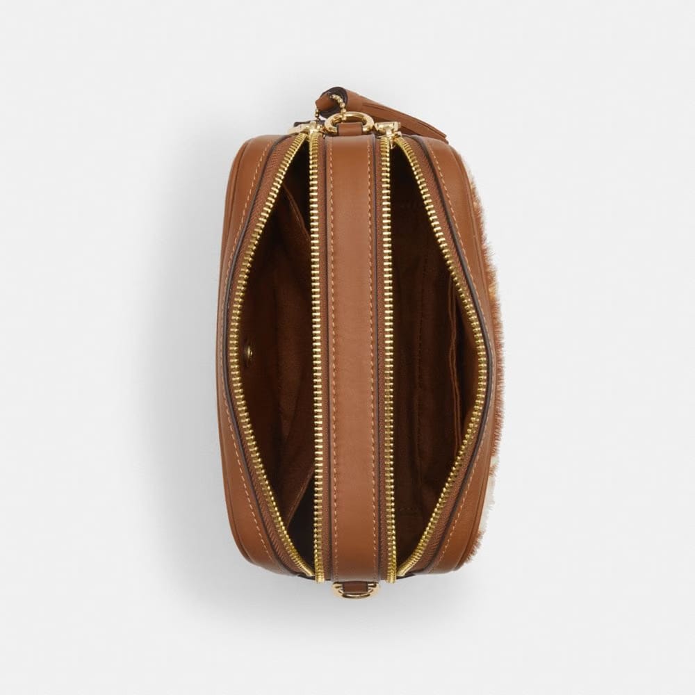 Mini Carey Crossbody Bag In Haircalf With Cow Print