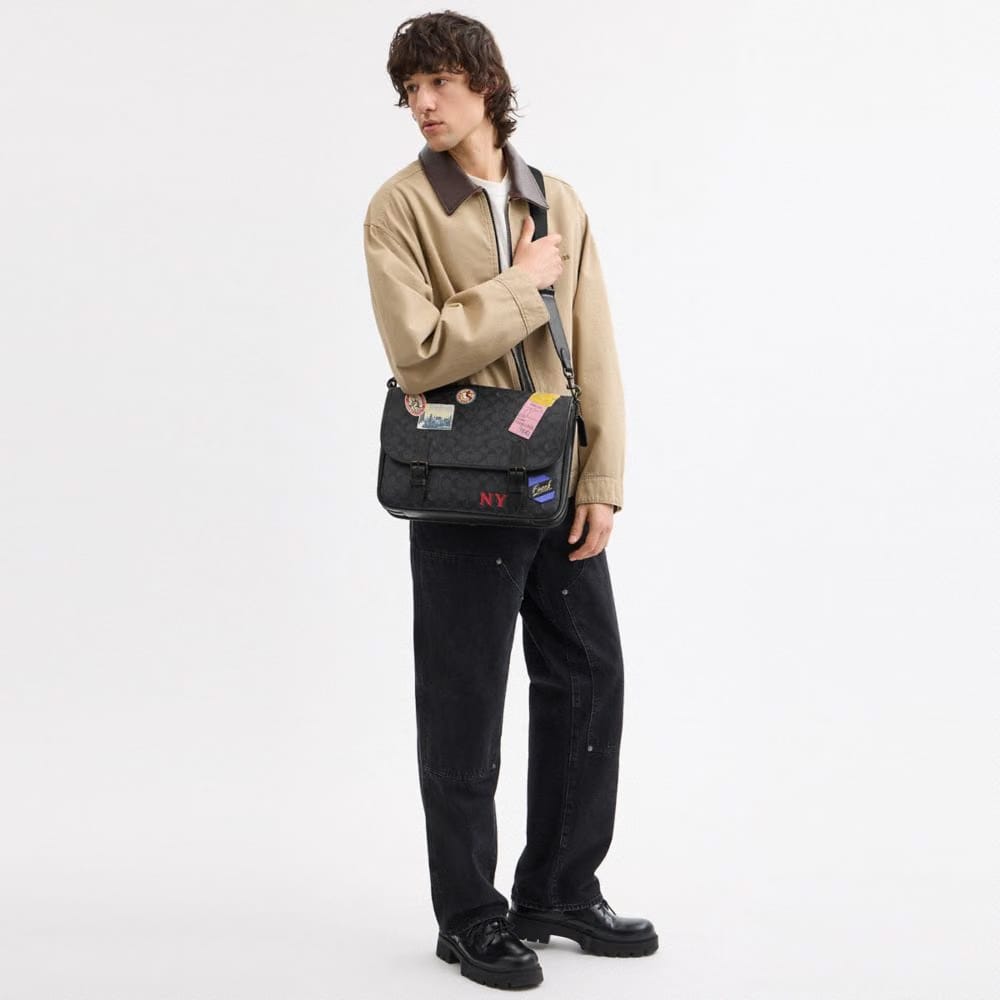 Hitch Messenger Bag In Signature Canvas With Patches
