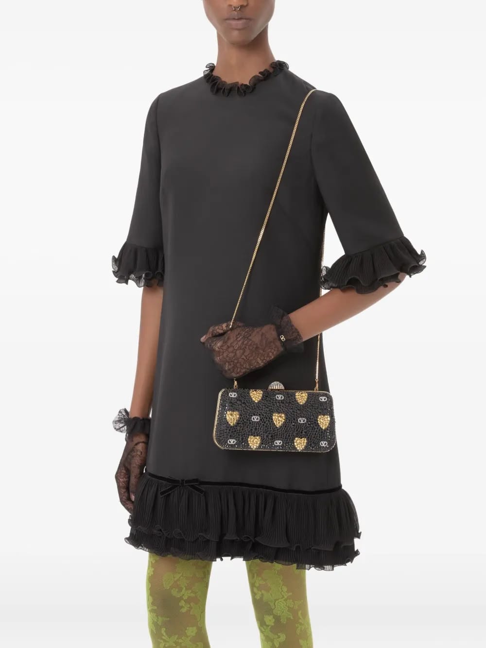 heart motif embellished clutch bag